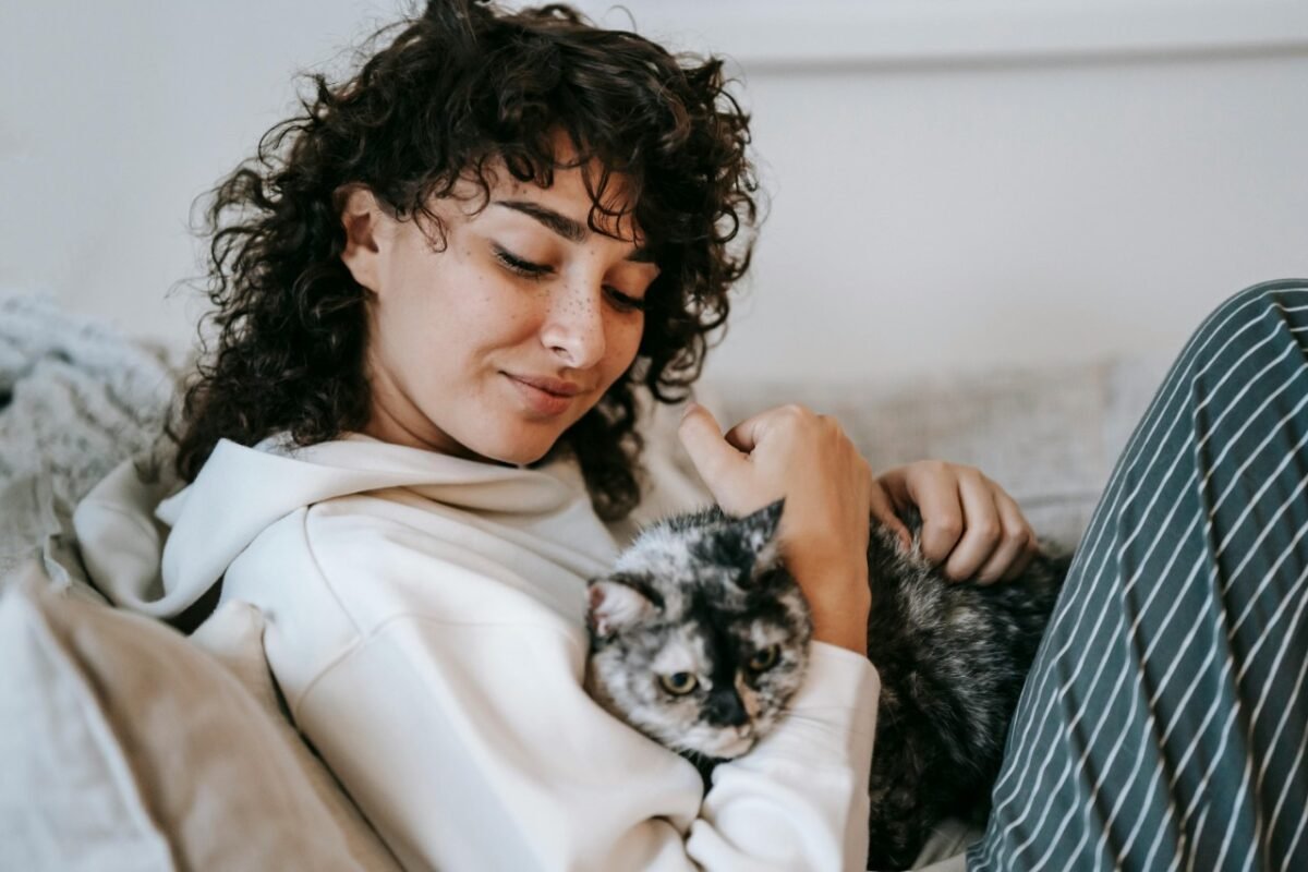 picture showing why every cat lover needs a cat pouch hoodie